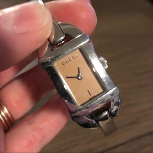Gucci watch with sand face
